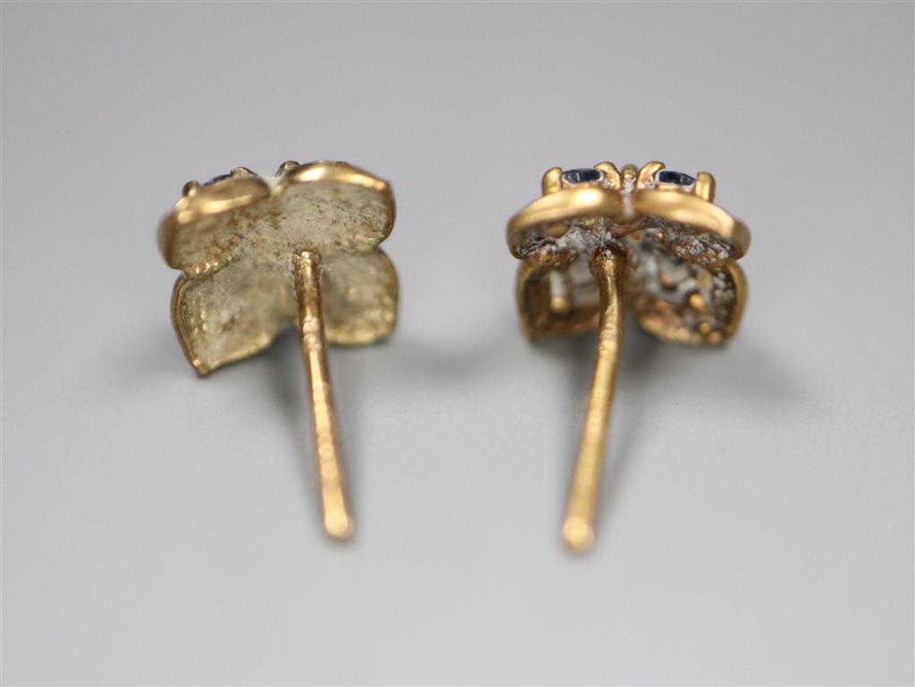 A pair of 9ct gold and gem set earrings, no butterflies, gross 0.9 grams.